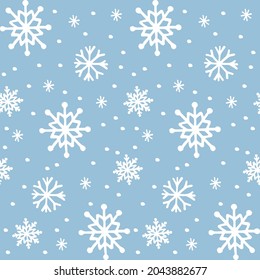 Cute frozen seamless pattern. Hand drawn snowflakes background. Snowfall backdrop. Christmas and winter decorative pattern for scrapbooking, fabric, wrapping paper or cards.  Vector illustration.