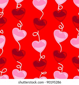 Cute and fun seamless pattern of strings of heart shapes in both red and pink colors, perfect for Valentine's day or other love concept