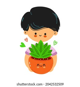 Cute funny boy hold indoor plant in hand. Little boy hugs cute indoor plant. Isolated on white background