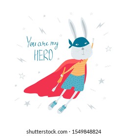 Cute, funny Bunny superhero in mask, raincoat, shorts, sneakers with carrot flying in flat style. Postcard with handwritten lettering You're my superhero. Illustration for kids. Vector