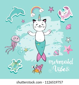 A cute funny cat with a mermaid's tail, marine life and the inscription of a mermaid vibes