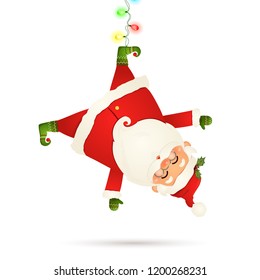 Cute, funny Santa Claus cartoon character hanging upside down with garland string of twinkle lights with multicolored bulbs isolated on white background. 