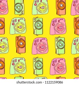 Cute and funny vintage hand drawn photo cameras seamless pattern vector