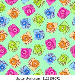Cute and funny vintage hand drawn photo cameras seamless pattern vector