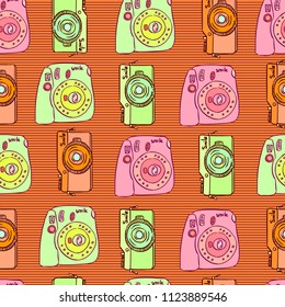 Cute and funny vintage hand drawn photo cameras seamless pattern vector