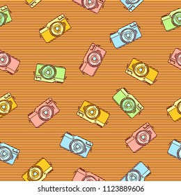 Cute and funny vintage hand drawn photo cameras seamless pattern vector