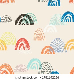 Cute geometric pattern. Hand drawn rainbow doodle vector seamless background in bright colors. Summer design.