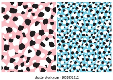 Cute Geometric Seamless Vector Patterns with Black and White Hand Drawn Spots Isolated on a Pastel Pink and Light Blue Background. Funny Abstract Scribbles Print ideal for Fabric, Textile. 