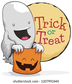 Cute ghost with a smiling candy basket like a pumpkin ready for the traditional "trick or treat" during Halloween celebration.