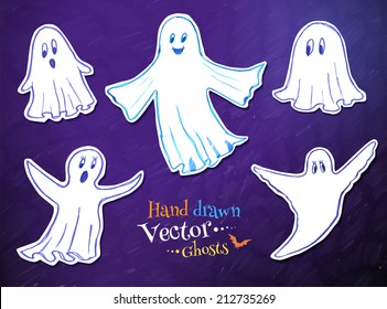 Cute ghosts. Childlike drawing. Vector set.
