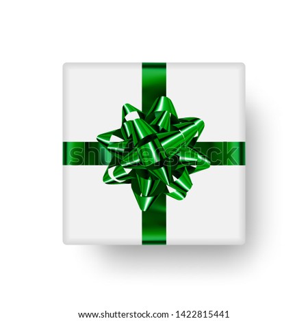 Cute gift box with shiny green bow in the shape star and realistic shadow. Top view. Ready clipart object to decorate holiday banner, poster, card and more.