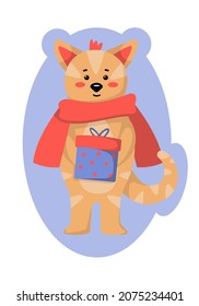 Cute ginger cat in a red scarf and holding a Christmas gift