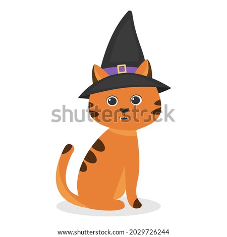 Cute ginger cat wearing a witch hat. Halloween.