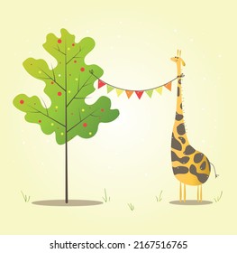 cute giraffe who stands near the tree. a festive garland of flags is tied to the giraffe's neck, the other end is tied to a tree