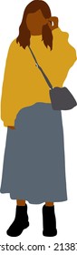 Cute girl in a big yellow sweater stands in full growth