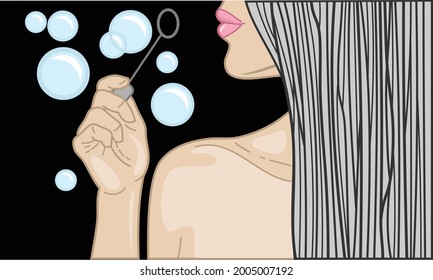 Cute girl blowing soap bubbles 