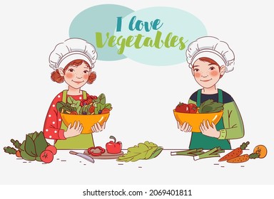 Cute girl and boy cooking salad in the kitchen