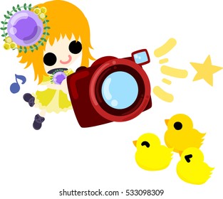 The cute girl and chicks and a camera