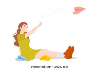 A cute girl in a green dress launches a paper airplane into the air and smiles. Vector illustration. The concept of communication, sending a message, mail.