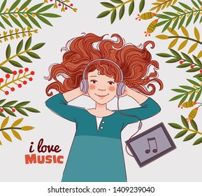 Cute girl in headphones listening to music