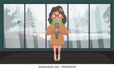 A cute girl is holding a gray cat in her arms. Cartoon style. Vector 