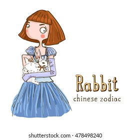 Cute girl holding rabbit - symbols of chinese horoscope.