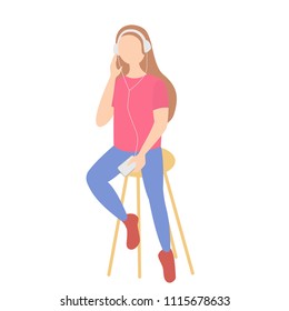 Cute girl with long hair holding her smartphone while listening to music in her headphones. Leisure and relax concept