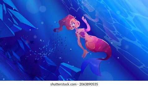 Cute girl mermaid under water in sea. Vector cartoon underwater landscape with beautiful woman fish with red hair and tail, school of fish and stones on ocean bottom