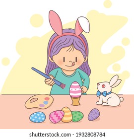 Cute girl are painting easter eggs. She wears bunny ears on the head. A white bunny is looking her. Happy easter day.