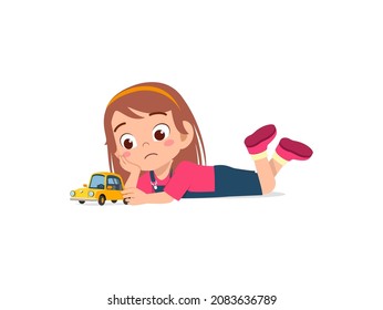 cute girl play toy car alone and feel sad