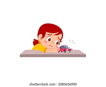 cute girl play toy car alone and feel sad