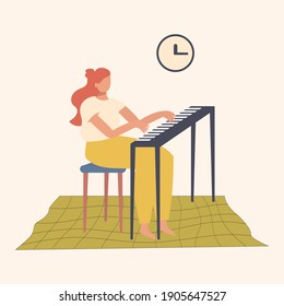 Cute girl playing electric synthesizer at home, favorite activity, music lesson. Home hobbies authentic