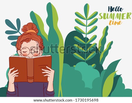 Cute girl reading a book