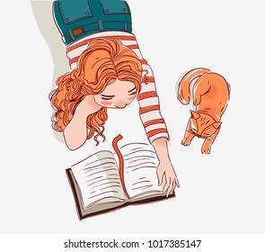 Cute girl reads a book