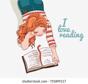 Cute girl reads a book