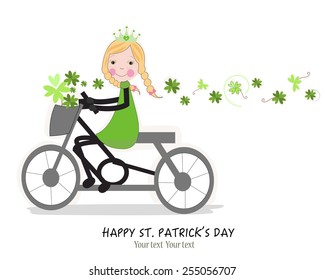 Cute girl riding a bicyle with Happy St. Patrick's Day card 