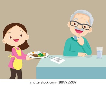 cute girl serving food to elderly senior grandfather.happy family cooking.