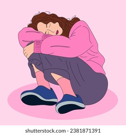 Cute girl sitting and hugging herself