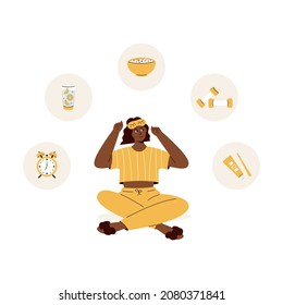 Cute girl with sleeping mask and elements for morning routine:lemon water,weights, muesli, alarm clock, toothpaste.Girl thinking about how to start her day.Woman in cute pajama.Good morning.