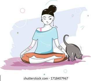 cute girl trying to practicise yoga with her cat near. gray cat interrapting meditation