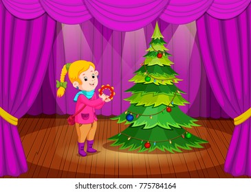 cute girl in winter clothes performing on stage