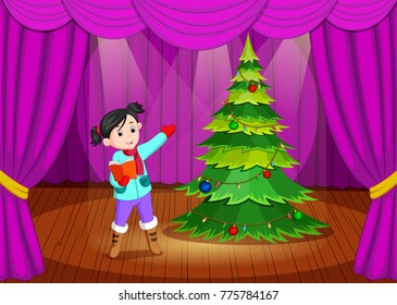 cute girl in winter clothes performing on stage