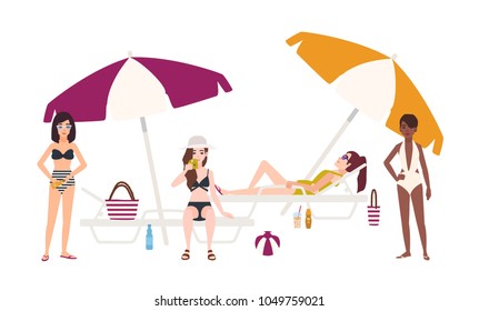 Cute girls dressed in swimsuits lying and sitting on sunloungers with umbrellas or standing beside it, relaxing and sunbathing. Young women in swimwear on beach. Flat cartoon vector illustration