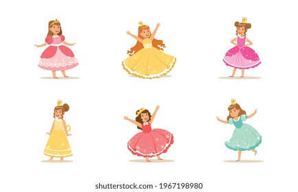 Cute Girls in Princess Dresses Set, Princesses with Crowns in Elegant Colorful Evening Gowns Cartoon Vector Illustration