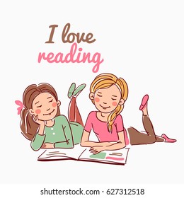 Cute girls reading a book