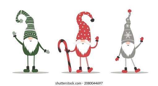 Cute gnomes in red santa hats on white background. Scandinavian christmas elves. Vector illustration in cartoon style. Nordic element design for greeting cards, season greetings, web, wrapper.