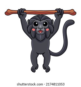 Cute goeldi's monkey cartoon hanging on tree