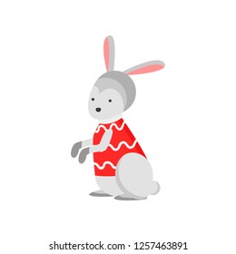 Cute good bunny symbol of the new year. Bunny in a trendy New Year sweater.