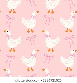 Cute goose vector seamless pattern with pink ribbons and bows on soft pink background for nursery decor, baby girl clothing, and cottagecore wallpaper.