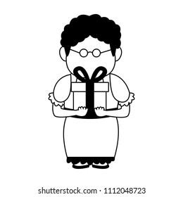 Cute grandmother with gift in black and white